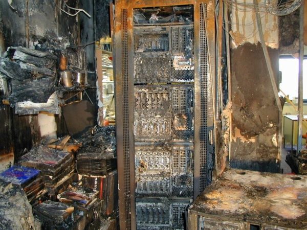 Image of burnt out server rack - Off site backups are essential